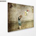 Canvas print Redhead girl with colour balloons at coast