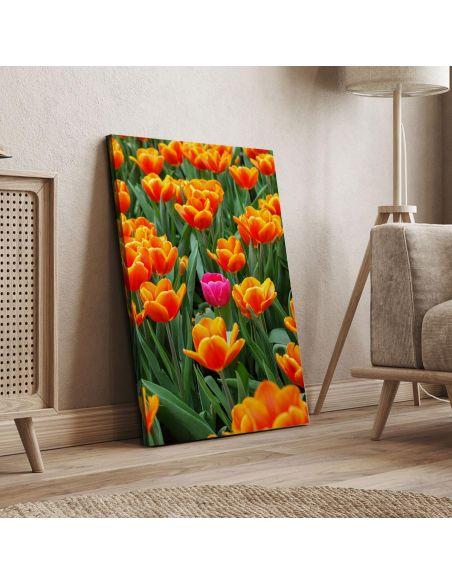 Canvas print Pink tulip between orange
