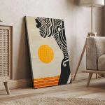 Canvas print, African woman at sunset I