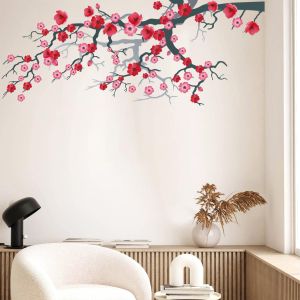 Wall stickers blooming branch, pink and red flowers. Pink blossomed branch