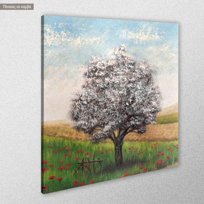 Canvas print Snow covered tree in a field with poppies