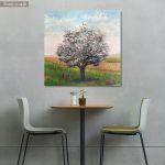 Canvas print Snow covered tree in a field with poppies