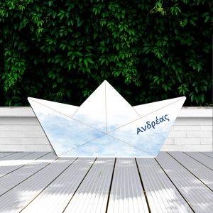 Wooden figure paper boat