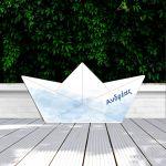 Wooden figure paper boat