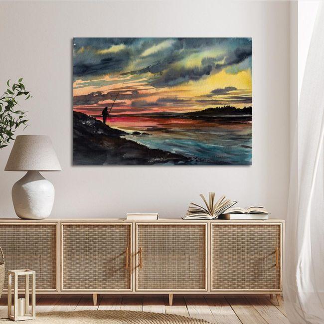 Canvas printFishing man on rocky shore