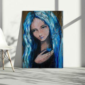 Canvas print Woman with blue hair holding small heart