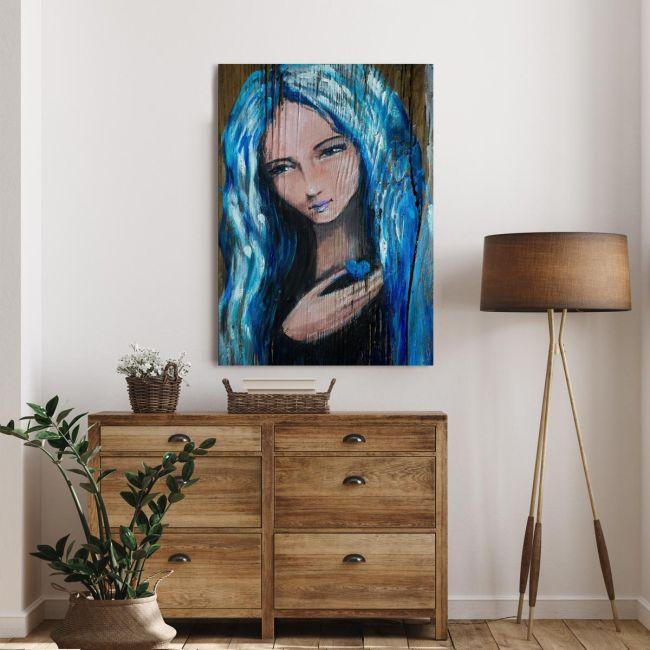 Πίνακας σε καμβά Woman with blue hair holding small heart