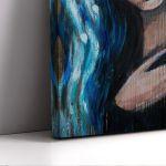 Canvas print Woman with blue hair holding small heart