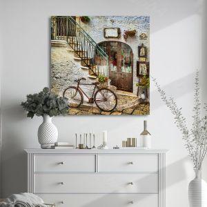 Πίνακας σε καμβά Old street with bicycle