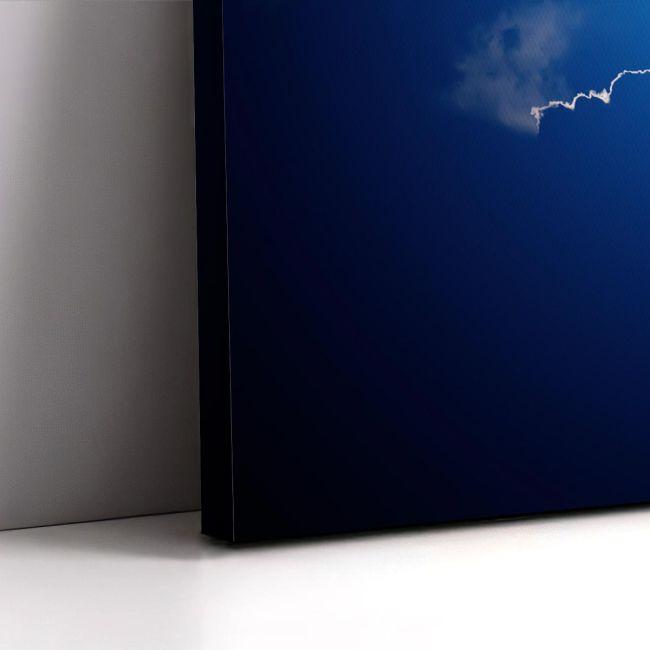 Canvas print Moon behind clouds