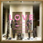 Shop window sales sticker, love is in the air