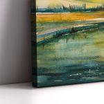 Canvas print Autumn tree reflecting in lake