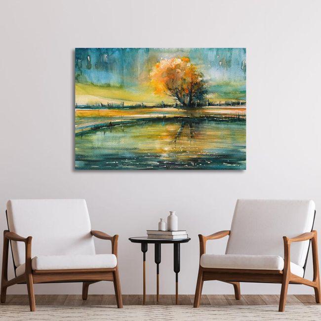 Canvas print Autumn tree reflecting in lake