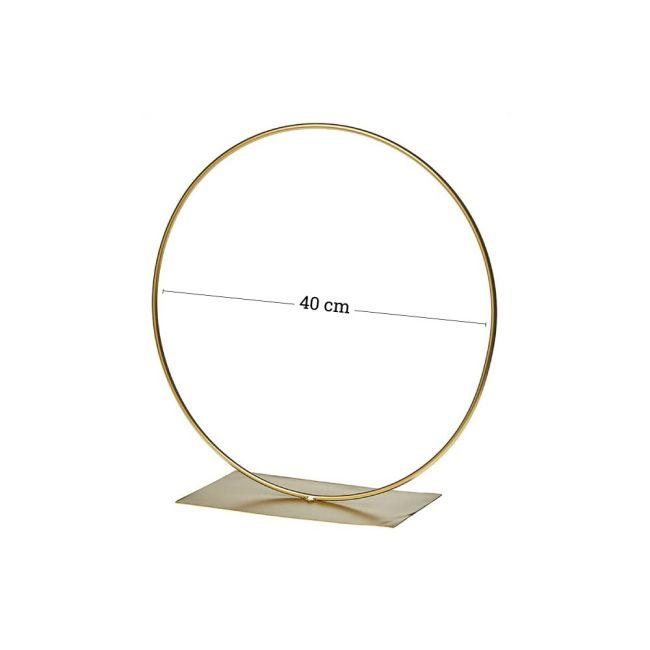 Metallic gold ring with stand