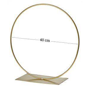 Metallic gold ring with stand