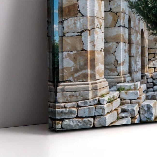 Canvas print Olive tree with ancient ruins in the background, horizontal