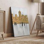 Canvas print Human figures in the brown city vertical