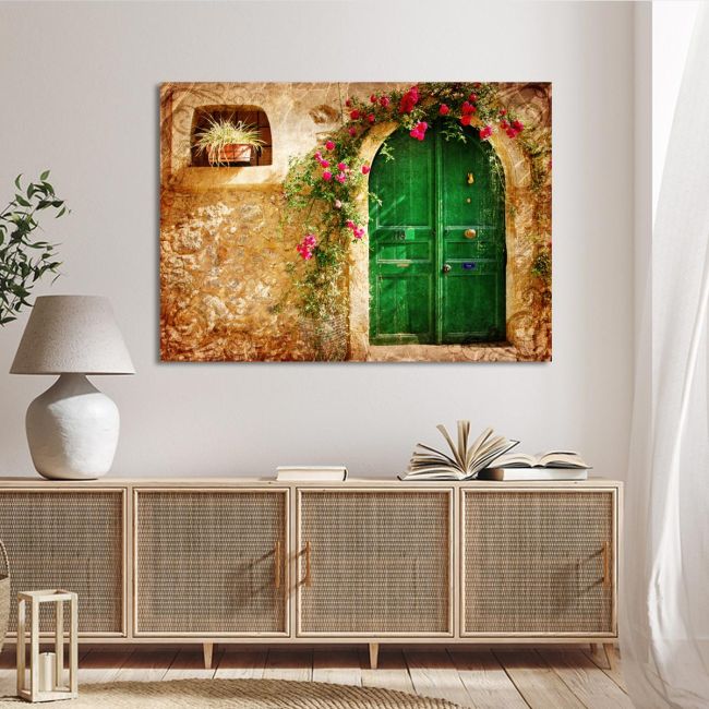 Canvas print Old house with green door