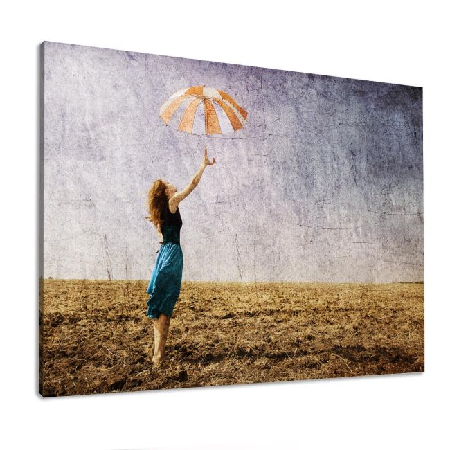 Canvas print Umbrella at field
