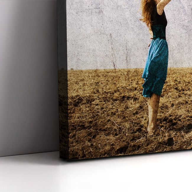 Canvas print Umbrella at field