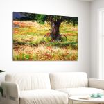 Canvas print Bicycle by the tree