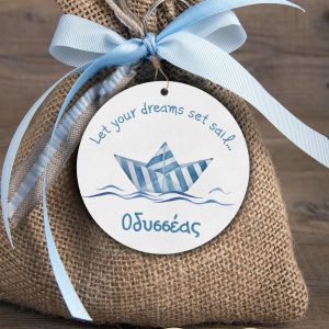 Wooden figure for favor, striped paper boat design.