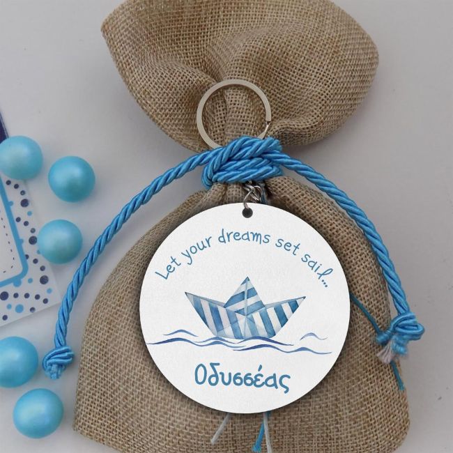 Wooden bonbonniere figure, with striped paper boat design.