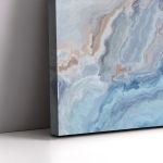Abstract blue marble texture canvas print with brown details. Leaning against wall., minimal style