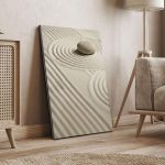 Vertical canvas print: Zen garden with raked sand and single stone. Minimalist art in a modern, light-toned room setting.