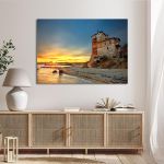 Canvas print: Chalkidiki's Ouranoupolis Tower, sunset over sea & beach. Mounted on a white wall.