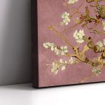 Close-up on a triptych canvas painting. Van Gogh's Almond Blossom with textured brushstrokes on a pink background.