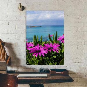 Πίνακας σε καμβά Purple wild flowers on beach
