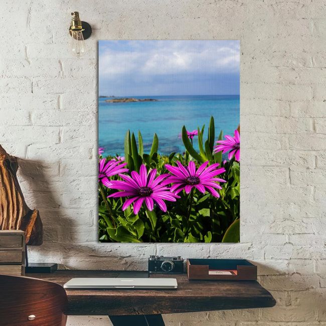 Πίνακας σε καμβά Purple wild flowers on beach