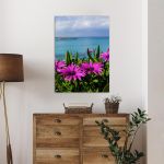 Πίνακας σε καμβά Purple wild flowers on beach