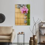 Canvas printPink orchid and gray stones