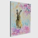 Canvas printHare on the spring meadow