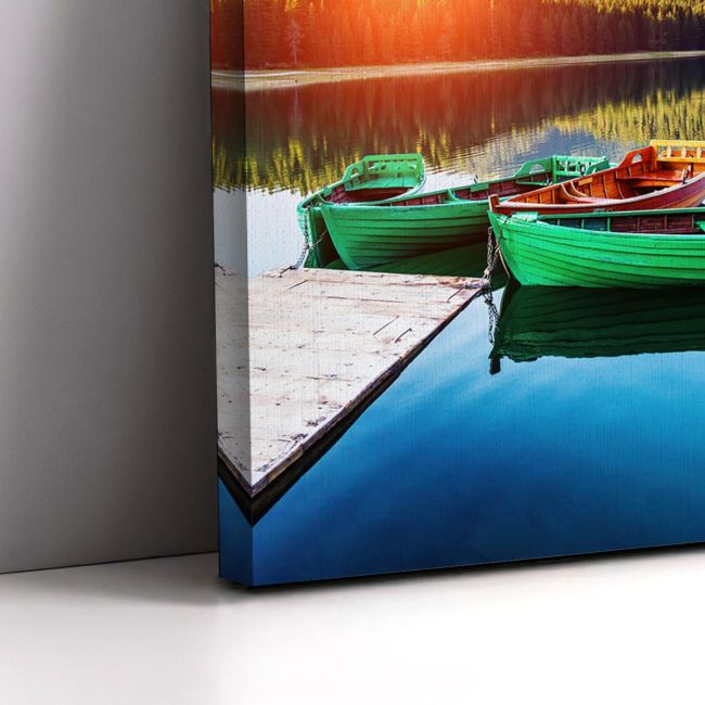Canvas print Boats on Black lake