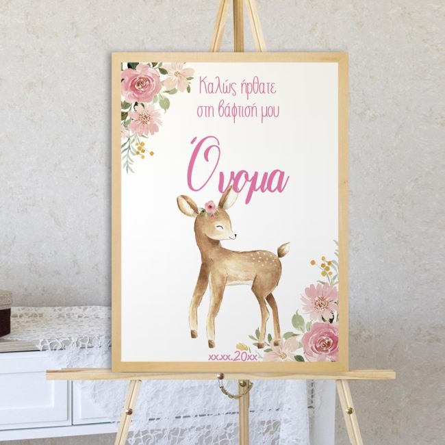 Baptism welcome sign with watercolor fawn, pink flowers. Natural wood frame, displayed on easel.