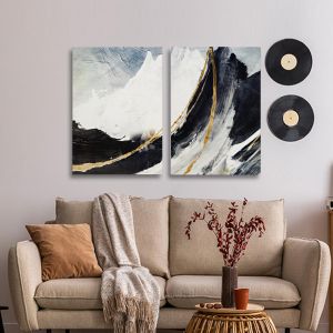 Diptych canvas print with abstract mountains and gold lines above a console table. 2