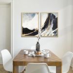 Diptych canvas print Abstract mountains golden lines in wooden frame above dining table