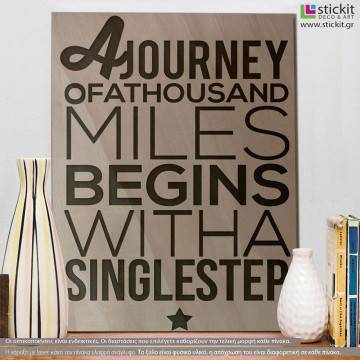 Wooden sign A journey of a thousand miles