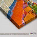 Canvas print Colorful street in Oia, side