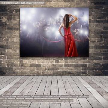 Canvas print Famous woman posing in front of paparazzi