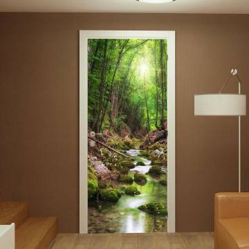 Αυτοκόλλητο πόρτας River deep in mountain forest