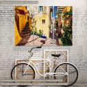 Canvas print Colorful mediterranean street in Crete,  3 panels