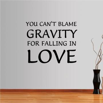 Αυτοκόλλητο τοίχου φράσεις. You can't blame gravity for falling in love