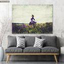 Canvas print Young girl in a sage flower field